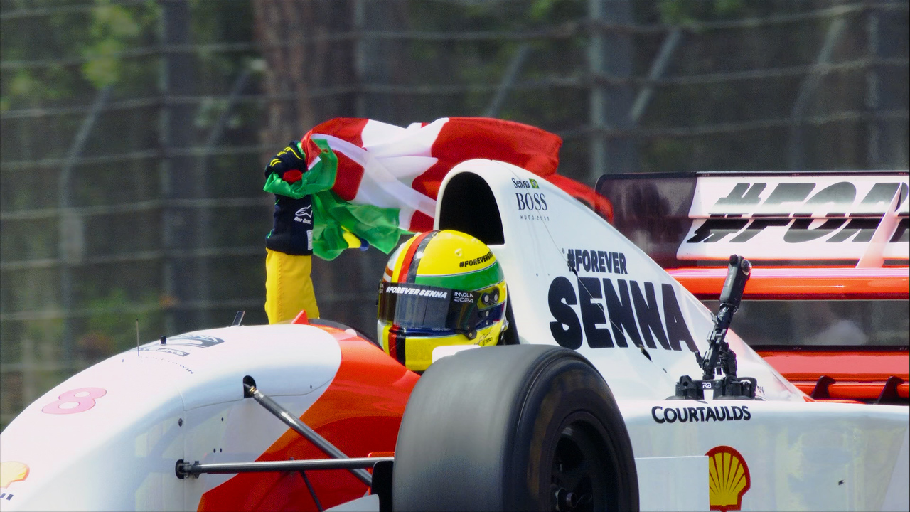 Sebastian Vettel driving Ayrton Senna's McLaren MP4/8
