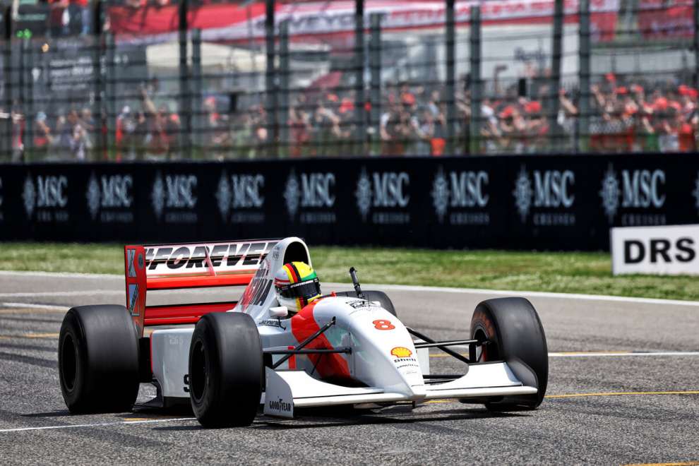 Sebastian Vettel driving Ayrton Senna's McLaren MP4/8