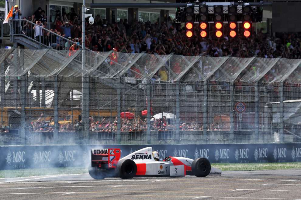 Sebastian Vettel driving Ayrton Senna's McLaren MP4/8